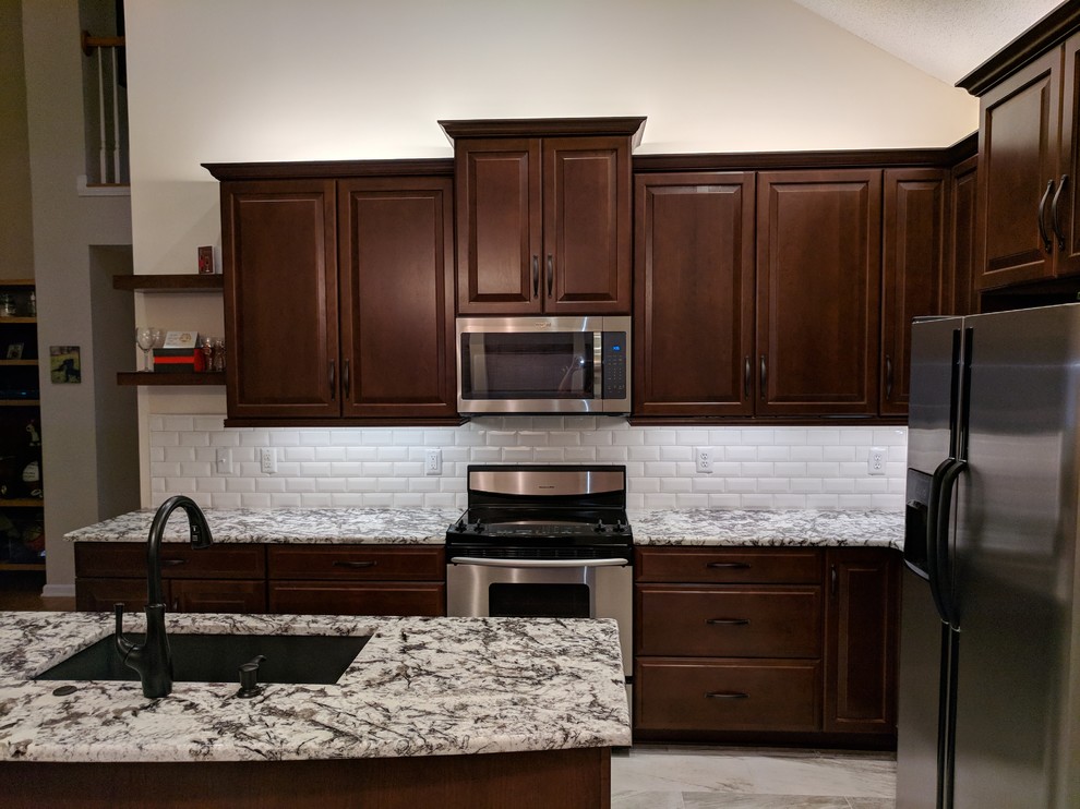 Example of a transitional home design design in Charlotte