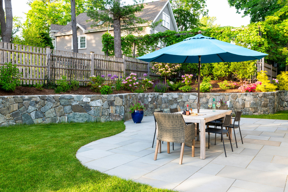 Inspiration for a transitional patio remodel in Boston with no cover