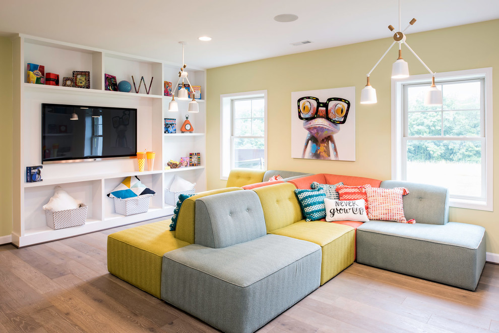 Design ideas for a transitional gender-neutral kids' playroom for kids 4-10 years old in Baltimore with yellow walls, medium hardwood floors and brown floor.