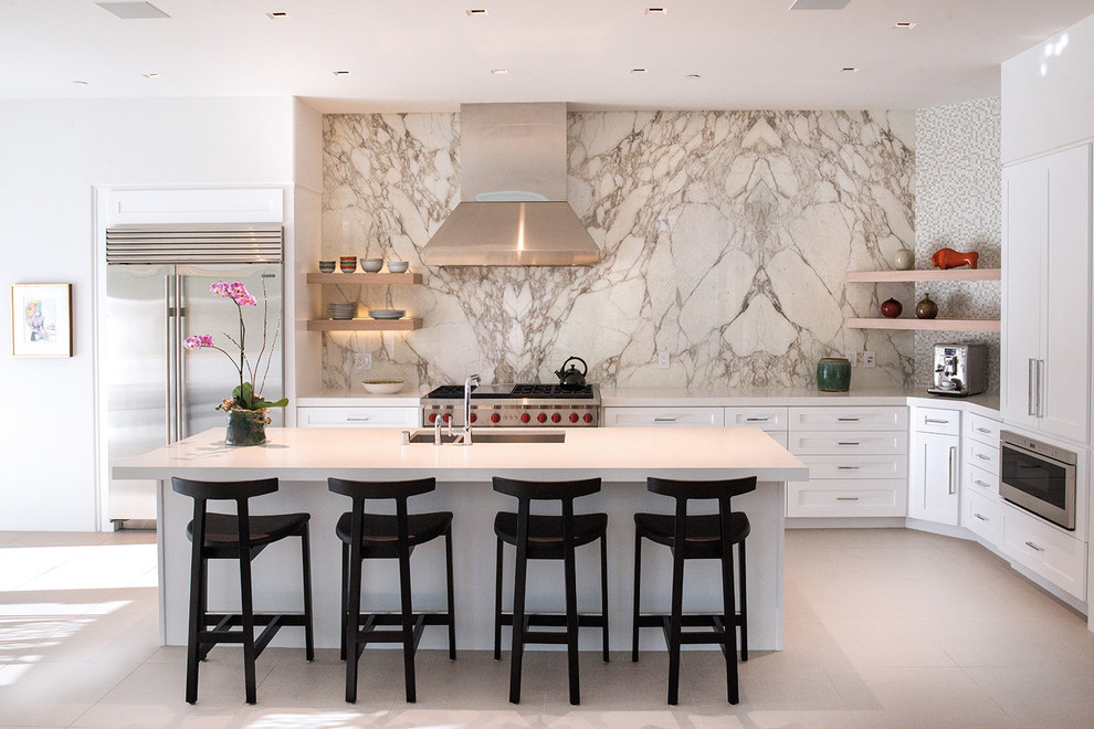 This is an example of a mid-sized transitional kitchen in Los Angeles.