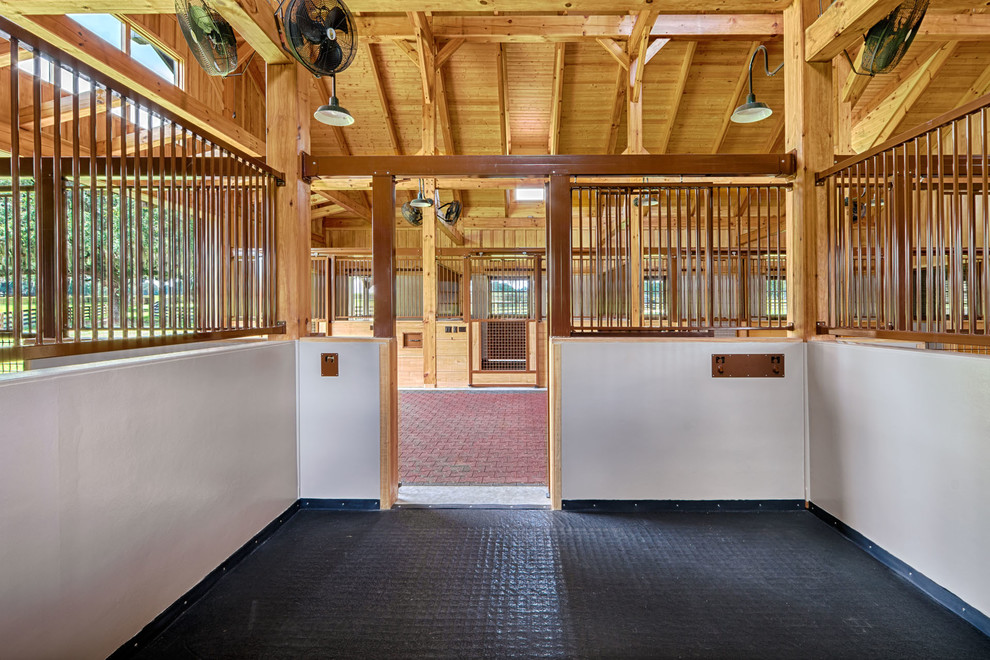 Inspiration for a large rustic two-story wood beige home design remodel