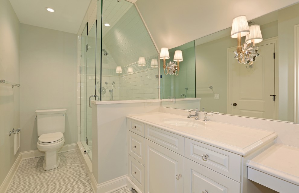 Inspiration for a mid-sized timeless white tile and subway tile ceramic tile corner shower remodel in Chicago with raised-panel cabinets, white cabinets, a one-piece toilet, white walls, an undermount sink and granite countertops