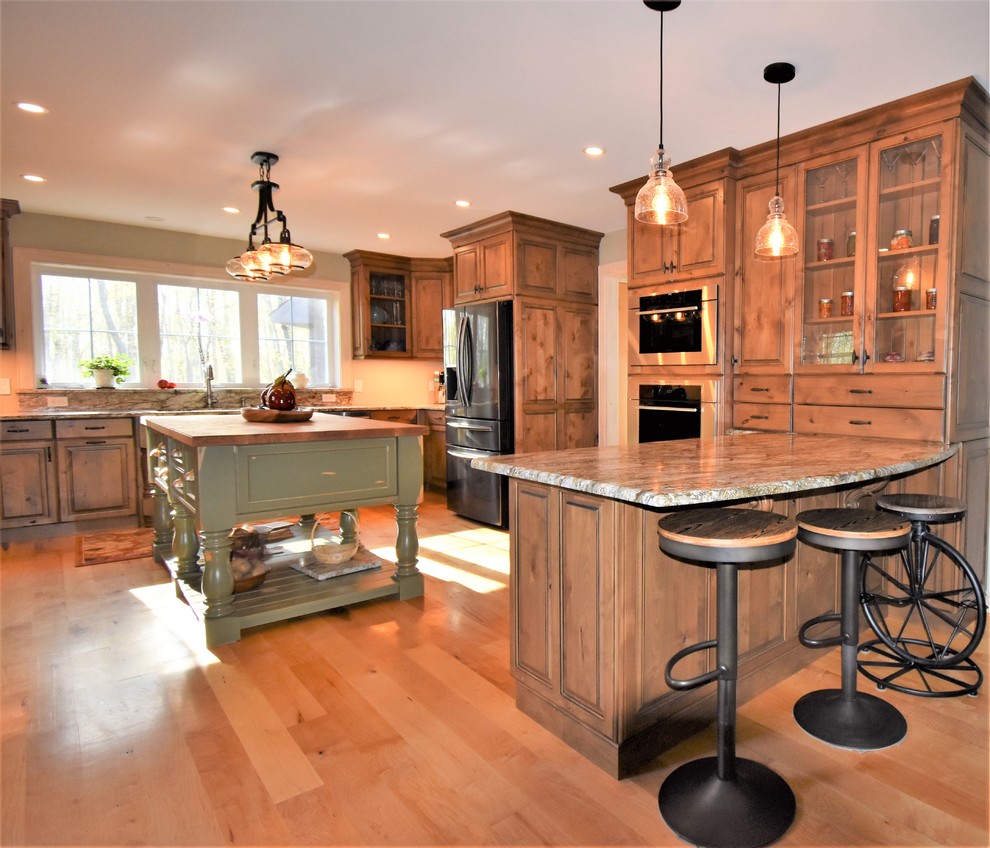 Inspiration for a huge rustic kitchen remodel with distressed cabinets