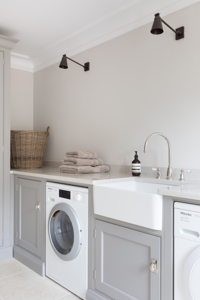 This is an example of a mid-sized transitional laundry room in Buckinghamshire.