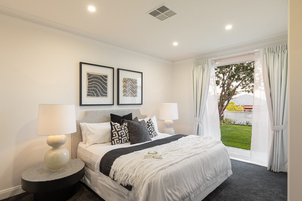Inspiration for a transitional bedroom in Brisbane with white walls, carpet and black floor.
