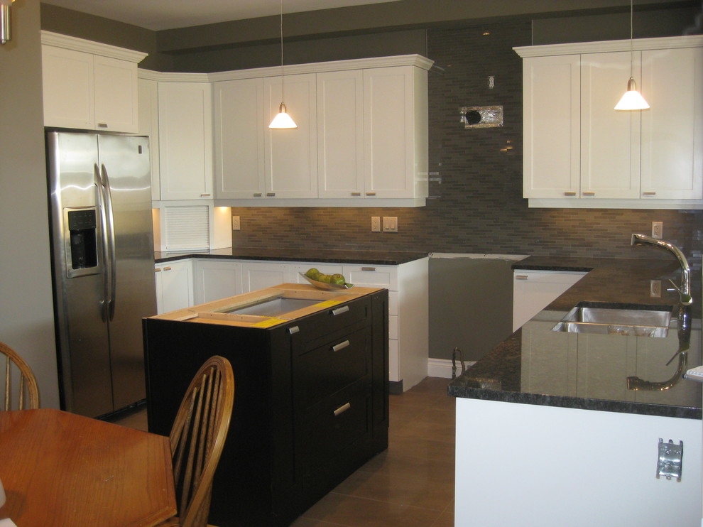 Mid-sized transitional kitchen photo in Ottawa with recessed-panel cabinets, white cabinets and granite countertops