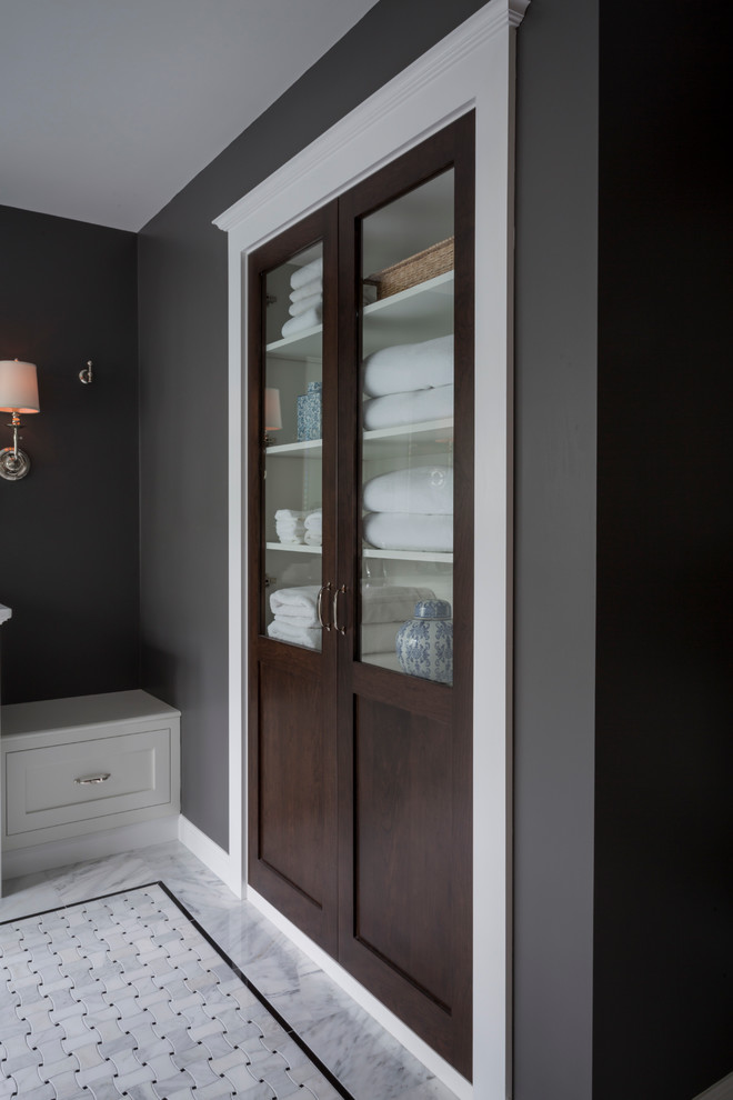 This is an example of a contemporary master bathroom in Providence with a curbless shower, black and white tile, grey walls and marble floors.