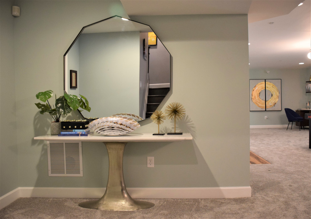 Mid-sized transitional look-out carpeted and gray floor basement photo in Baltimore with green walls and no fireplace
