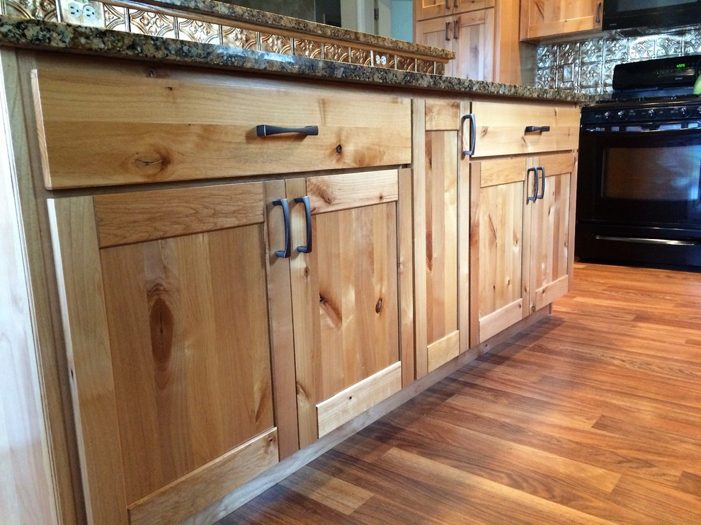 Inspiration for a mid-sized rustic l-shaped eat-in kitchen remodel in Phoenix with shaker cabinets and an island