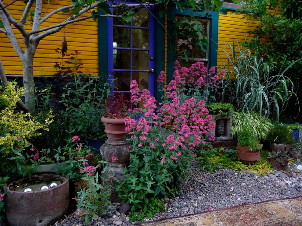 Eclectic garden in Portland with a container garden.