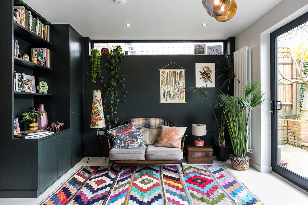 This is an example of a mid-sized eclectic family room in London with white floor and concrete floors.