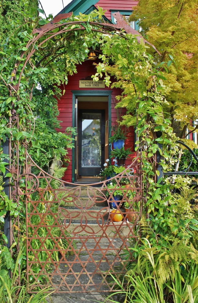 Design ideas for an eclectic front door in Seattle with a single front door.