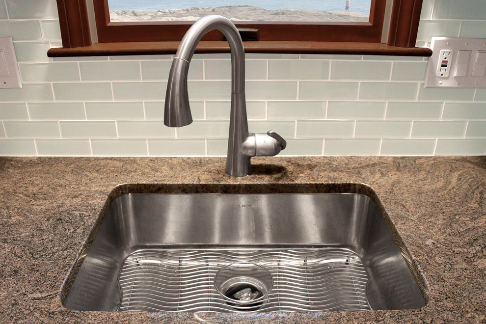 Mid-sized transitional l-shaped ceramic tile eat-in kitchen photo in Boston with an undermount sink, shaker cabinets, gray cabinets, granite countertops, gray backsplash, glass tile backsplash, stainless steel appliances and an island