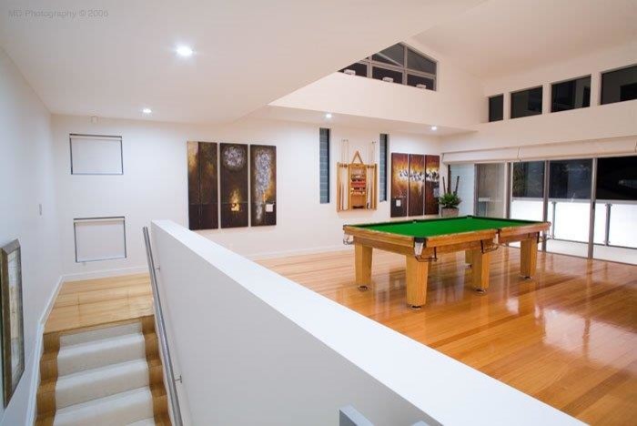 Photo of a contemporary home bar in Brisbane.