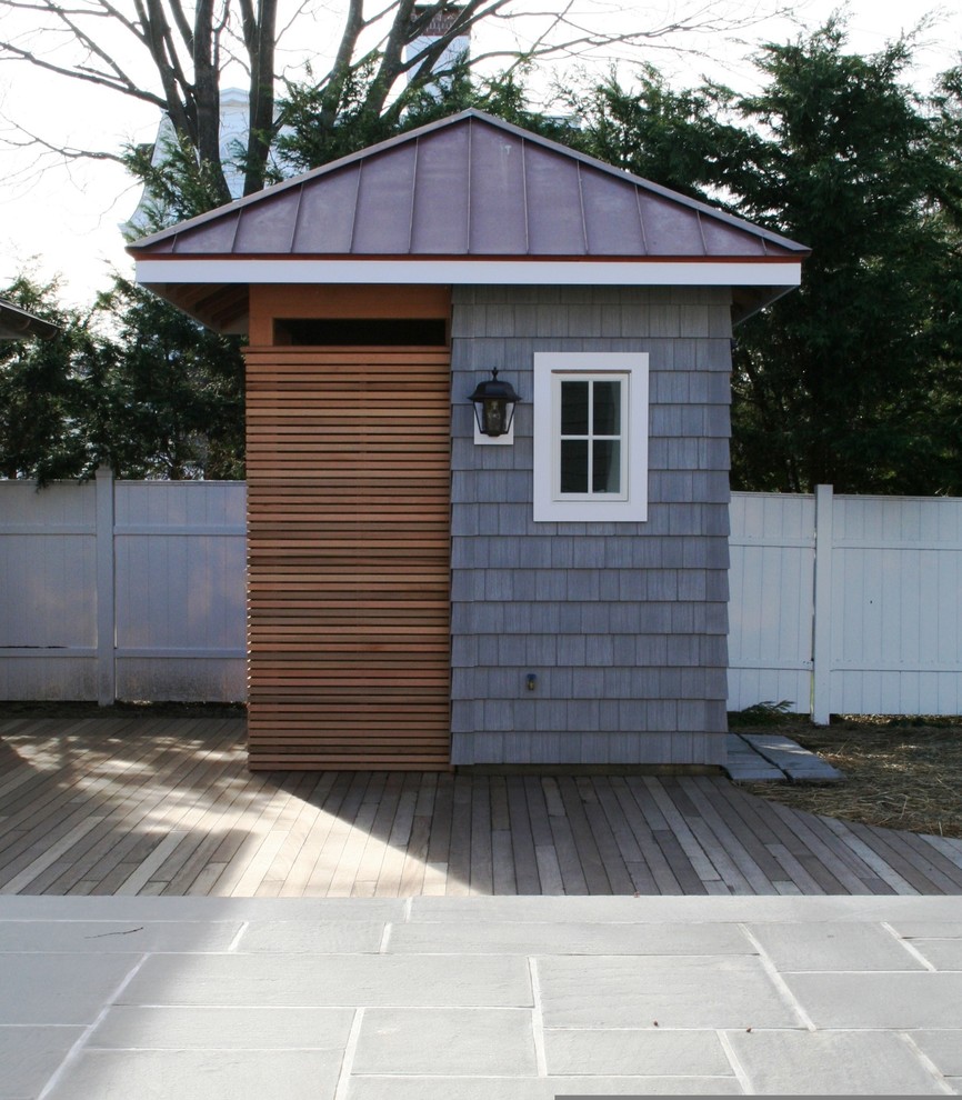 Mid-sized transitional detached garden shed in New York.