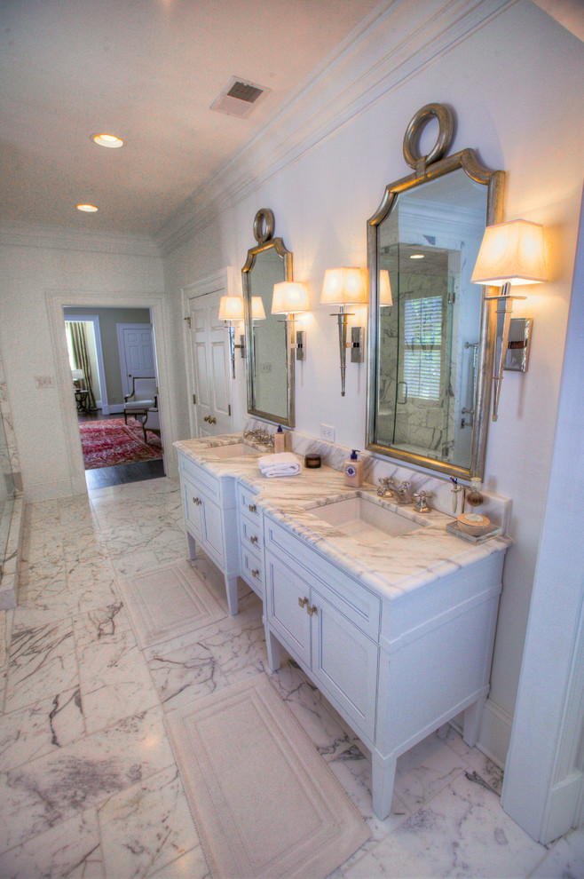 Freestanding bathtub - mid-sized transitional master gray tile, white tile and stone slab marble floor freestanding bathtub idea in Charlotte with shaker cabinets, white cabinets, a two-piece toilet, white walls, an undermount sink and marble countertops