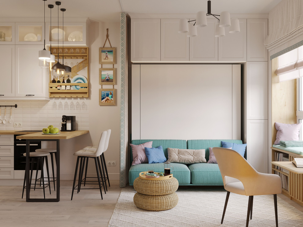 Esempio di un piccolo soggiorno scandinavo con pareti beige e pavimento in laminato