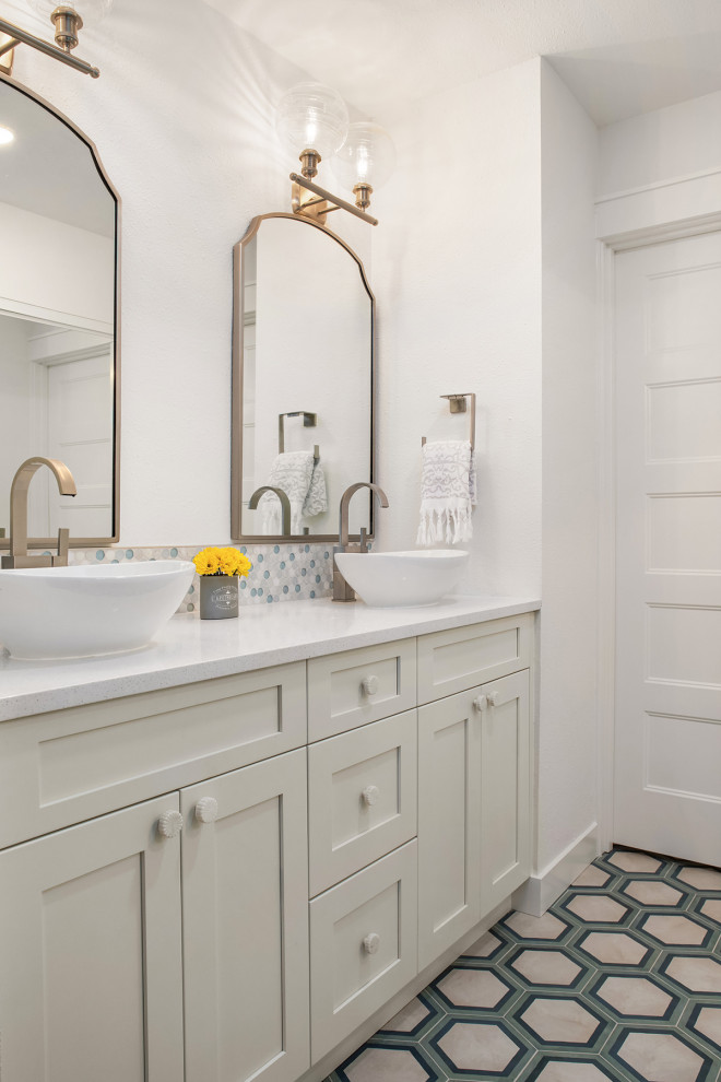 Inspiration for a transitional master bathroom in Seattle with shaker cabinets, white cabinets, blue tile, ceramic tile, white walls, ceramic floors, a vessel sink, engineered quartz benchtops, white benchtops, a double vanity and a built-in vanity.