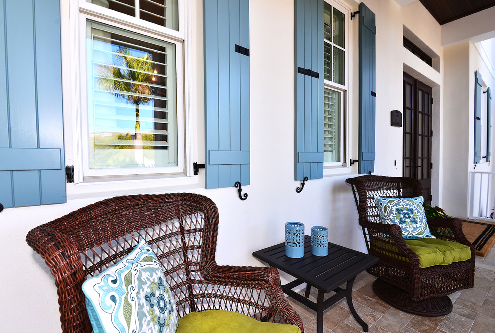 This is an example of a beach style verandah in Tampa.