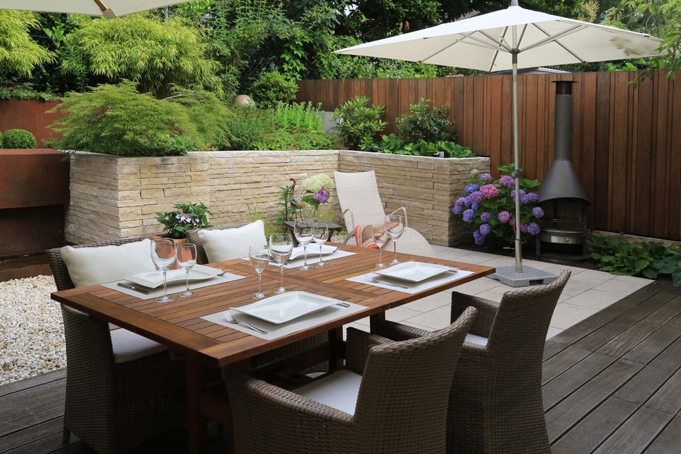 Unbedeckter, Großer Klassischer Patio hinter dem Haus mit Dielen in Sonstige