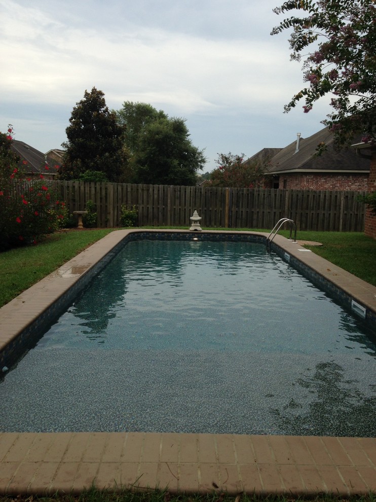 Transitional pool photo in Miami