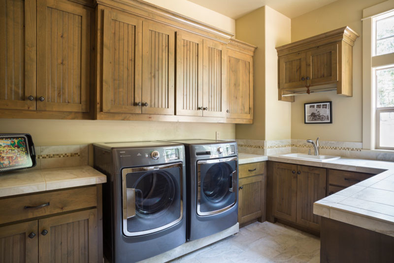 Design ideas for an arts and crafts laundry room in New York.