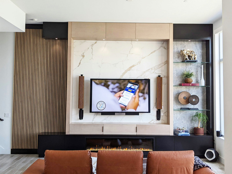 Custom BuiltIn Modern Entertainment Center with Wood Slatted Wall and
