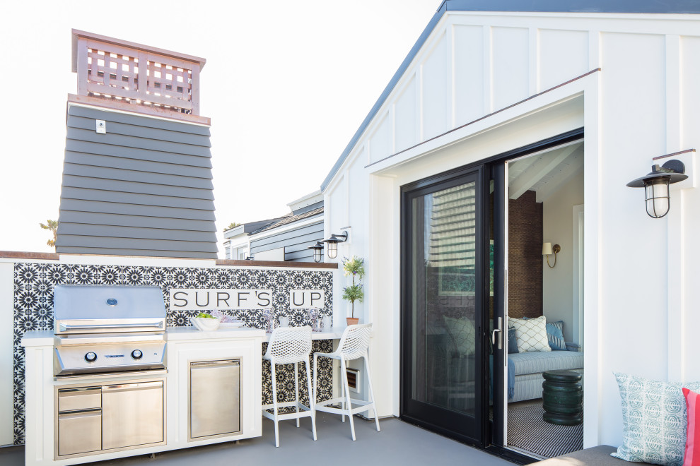 Inspiration for a nautical terrace in Orange County with a bbq area.