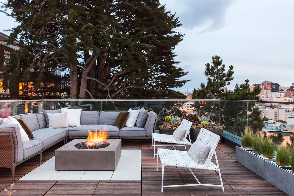 Photo of a contemporary rooftop and rooftop deck in San Francisco with a fire feature and no cover.