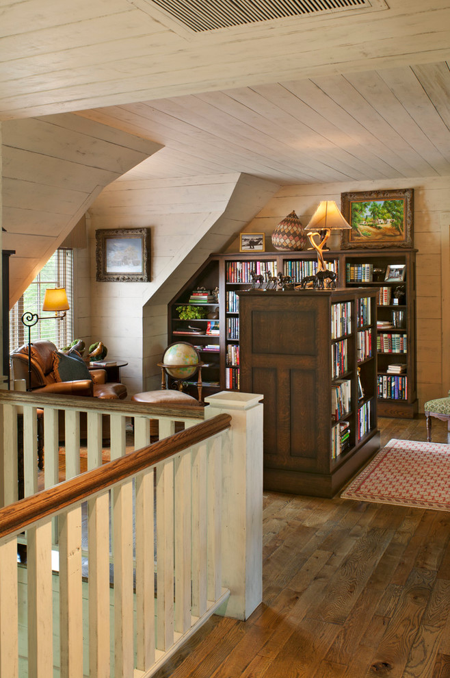 Inspiration for a traditional home office in Other with dark hardwood floors.