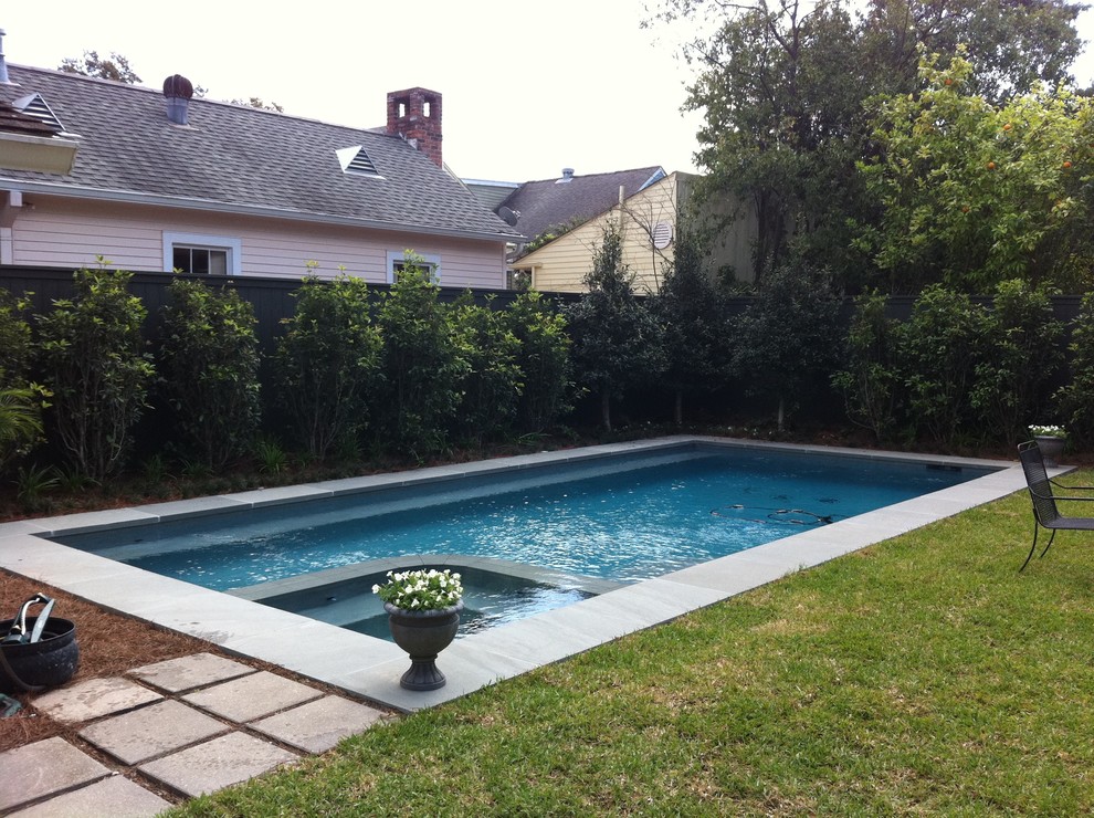 Design ideas for a mid-sized traditional backyard rectangular pool in New Orleans.