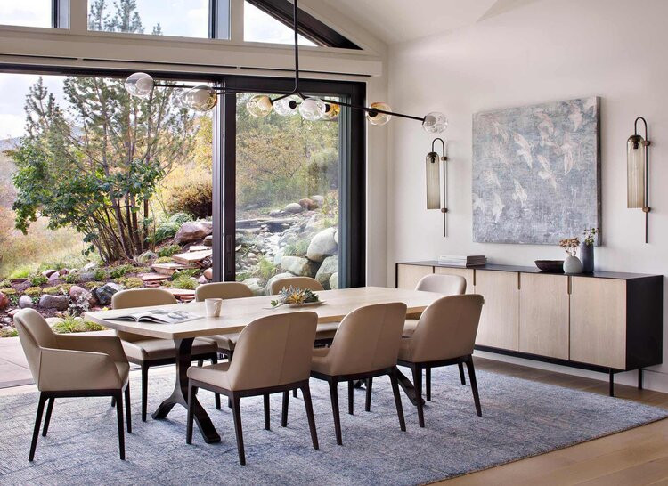 Inspiration for a medium sized modern open plan dining room in Denver with medium hardwood flooring and no fireplace.