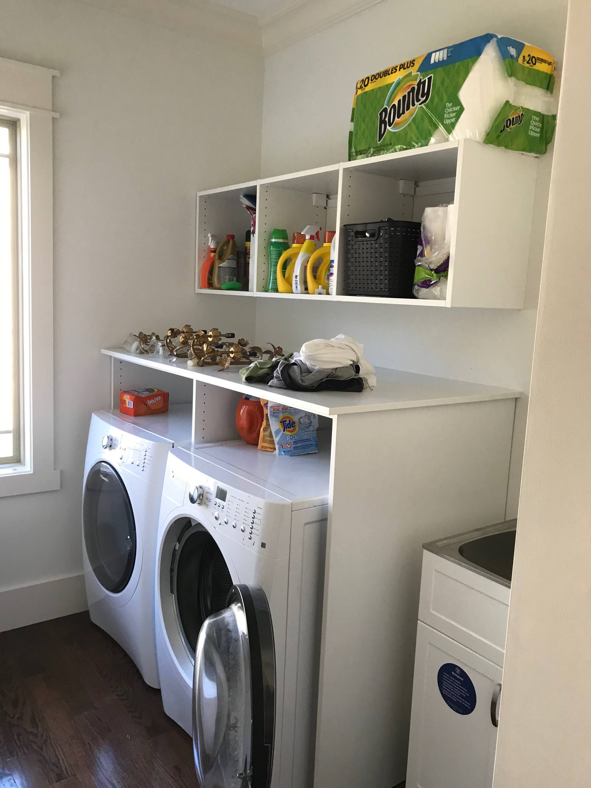 Custom Laundry Room Storage with Counter Space and Shelving