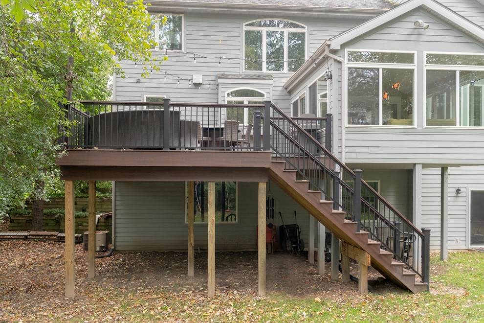 Deck - mid-sized transitional backyard deck idea with no cover