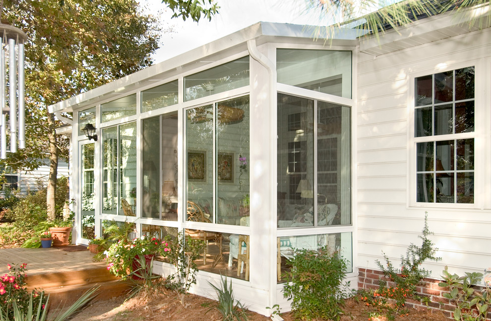 This is an example of a modern sunroom in Other.