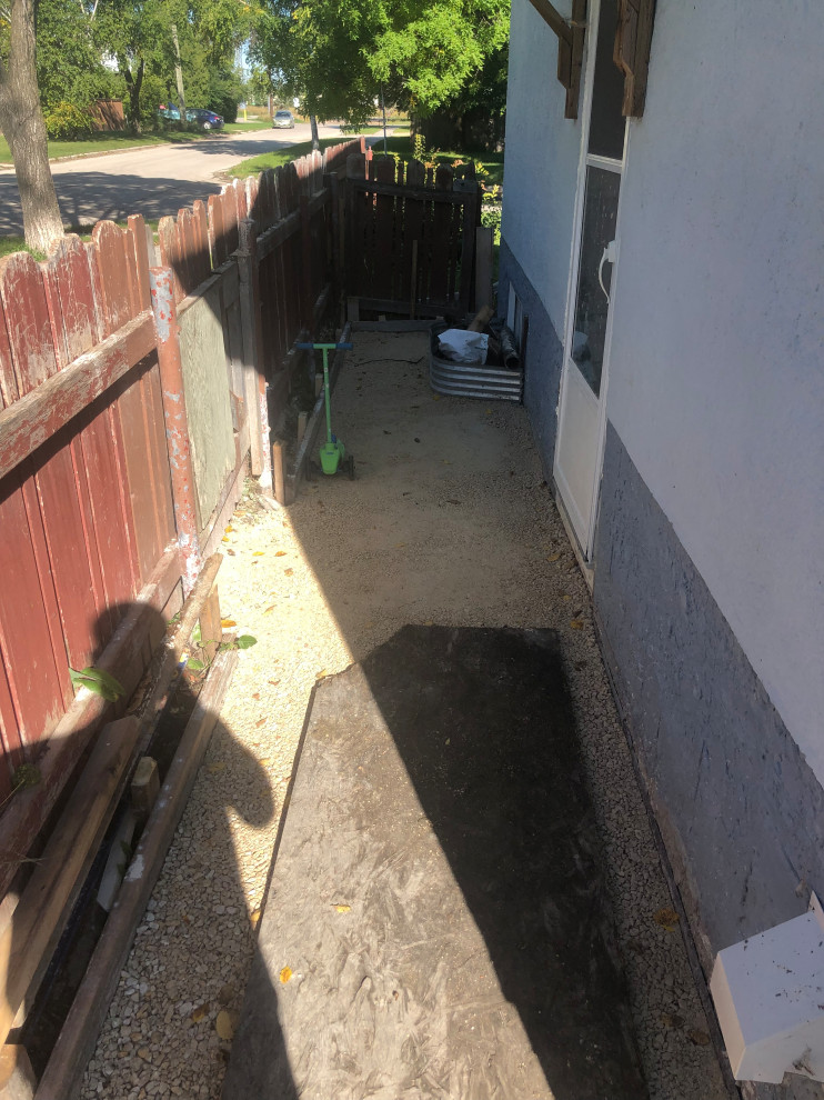 How to stop my sidewalk from sinking towards house again?