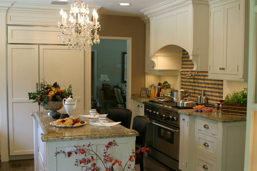 Inspiration for a mid-sized rustic enclosed kitchen remodel in Miami with beaded inset cabinets, white cabinets, granite countertops, white backsplash, stainless steel appliances and an island