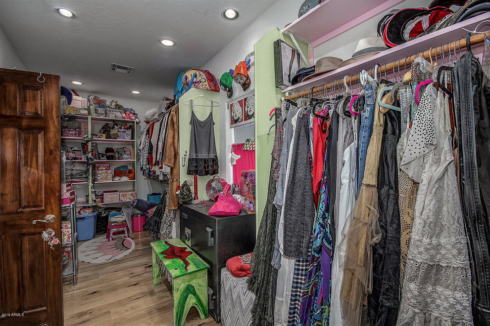 Example of a southwest closet design in Phoenix