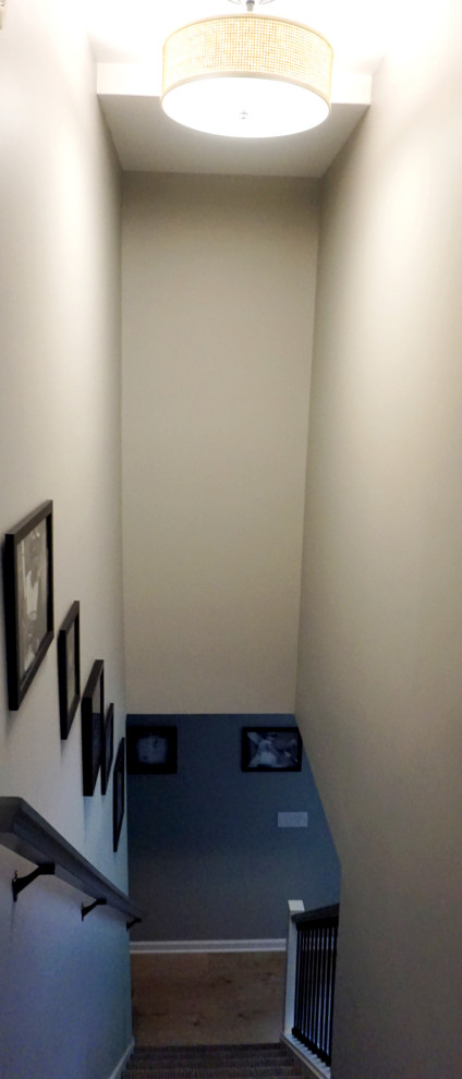 Example of a transitional vinyl floor basement design