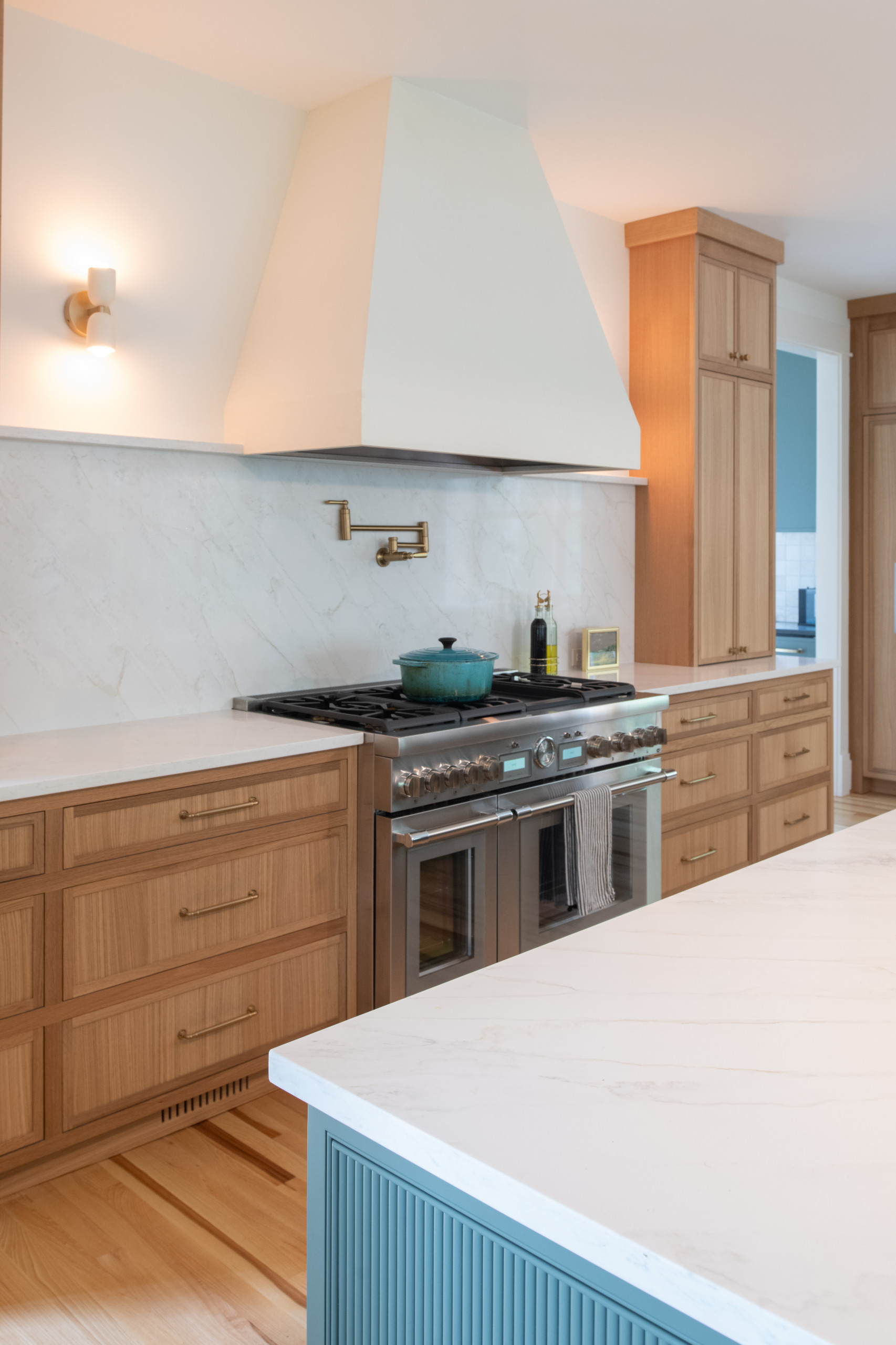 Warm Modern Kitchen Renovation with Natural Oak & Green Accents