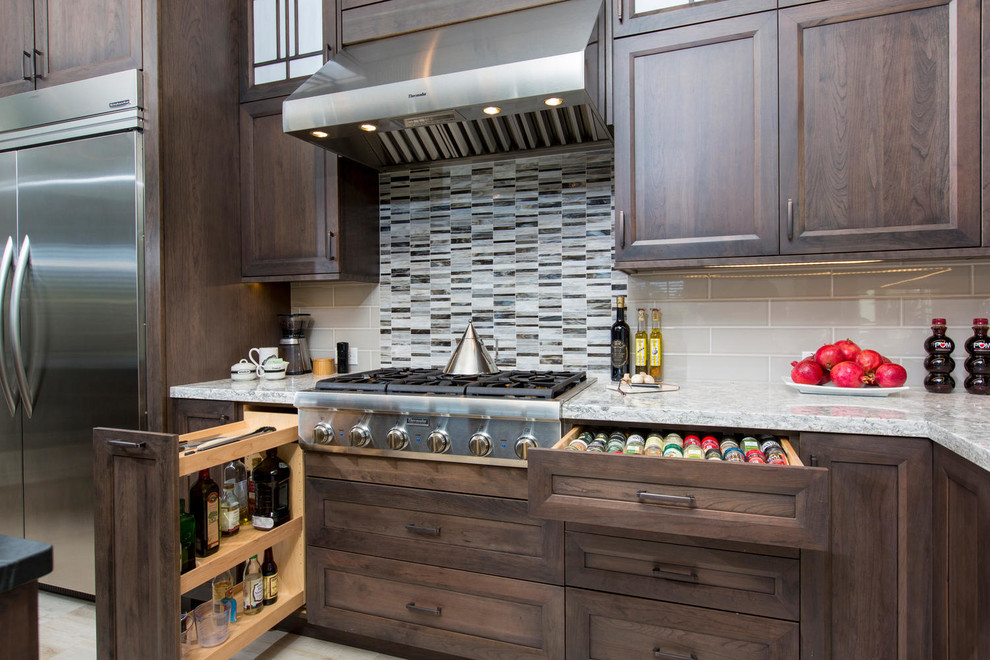 Example of a transitional kitchen design in Denver