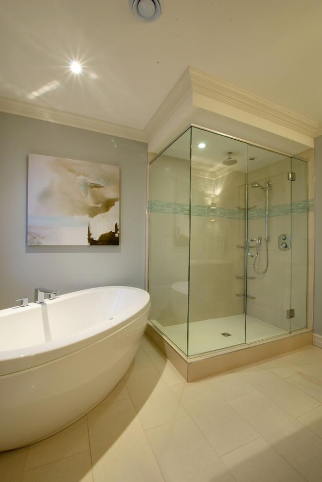 Photo of a contemporary bathroom in Other with a freestanding tub.