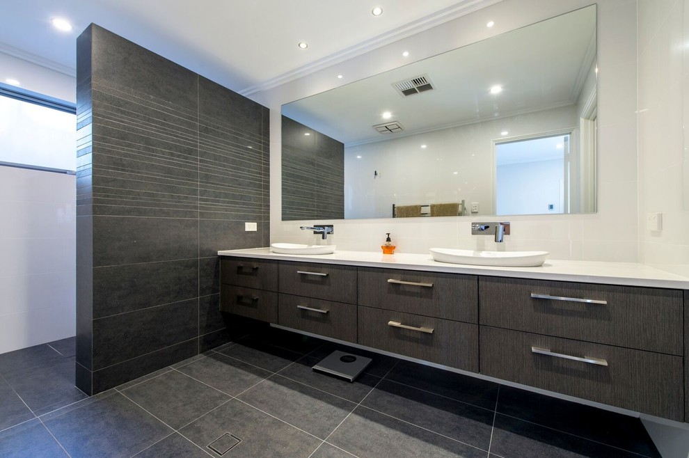 Inspiration for a mid-sized contemporary master bathroom in Perth with flat-panel cabinets, dark wood cabinets, an open shower, white tile, porcelain tile, white walls, porcelain floors, a drop-in sink, engineered quartz benchtops and an open shower.