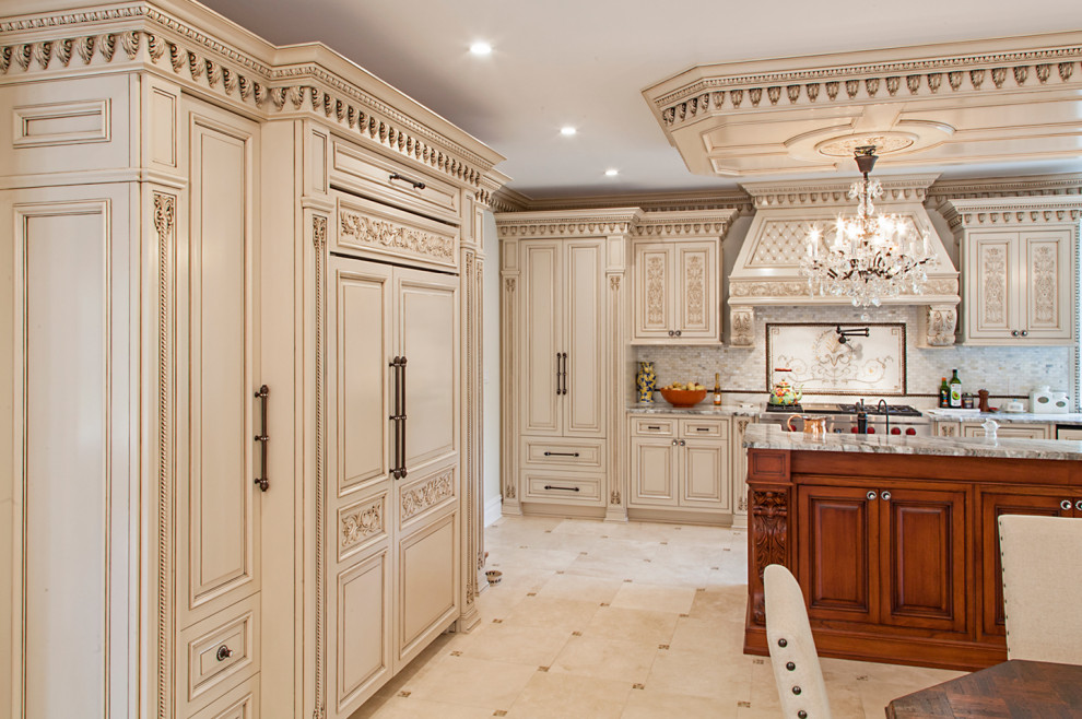 Inspiration for a large traditional u-shaped eat-in kitchen in New York with a drop-in sink, shaker cabinets, beige cabinets, quartz benchtops, grey splashback, engineered quartz splashback, panelled appliances, with island, beige floor, beige benchtop and coffered.