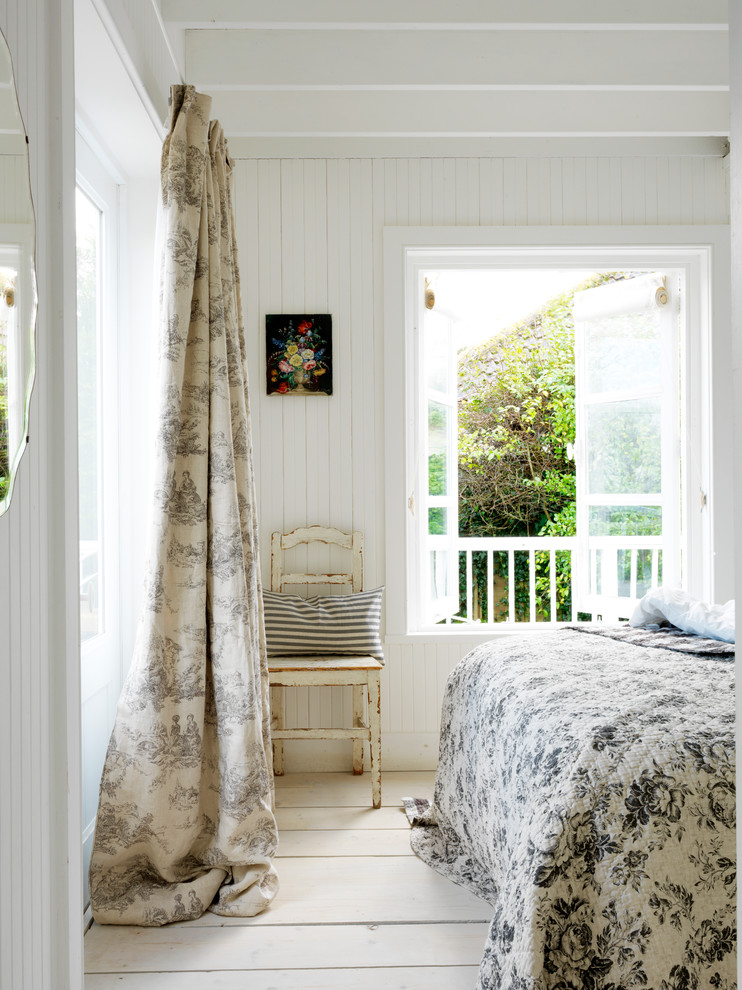 Inspiration for a beach style bedroom in London.