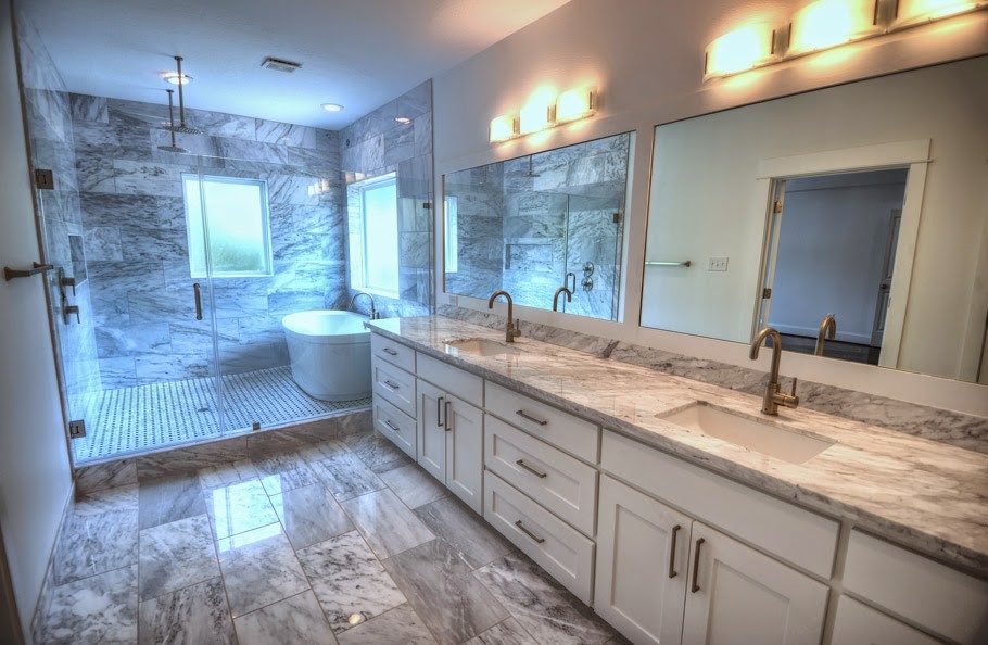Mid-sized transitional master bathroom in Houston with an undermount sink, shaker cabinets, light wood cabinets, granite benchtops, a freestanding tub, a double shower, white tile, stone slab, white walls and mosaic tile floors.