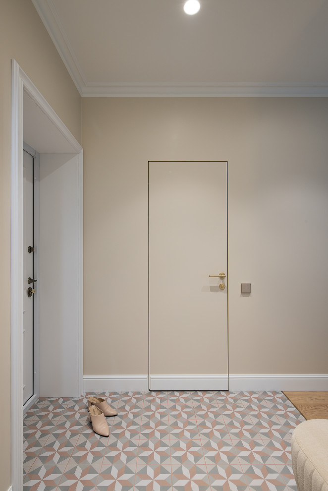 Medium sized traditional entrance in Other with beige walls, ceramic flooring and multi-coloured floors.