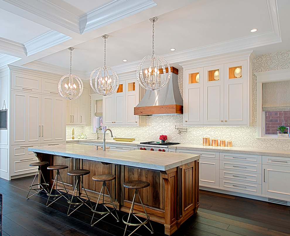 Huge transitional single-wall dark wood floor, brown floor and coffered ceiling open concept kitchen photo in Chicago with white cabinets, white backsplash, an island, mosaic tile backsplash, stainless steel appliances, white countertops, recessed-panel cabinets and quartzite countertops