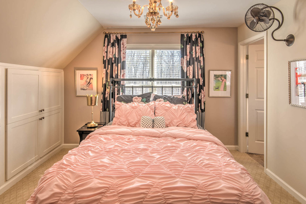 This is an example of a small traditional guest bedroom in Atlanta with pink walls, carpet and beige floor.