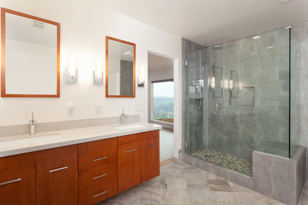 Contemporary master wet room bathroom in San Francisco with flat-panel cabinets, orange cabinets, a two-piece toilet, white walls, ceramic floors, an undermount sink, multi-coloured floor, a hinged shower door, quartzite benchtops and beige benchtops.